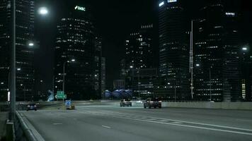 Highway express way of Singapore city with background of highrise financial city building video