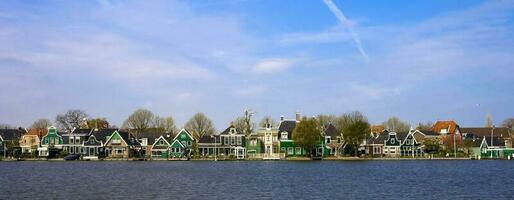 Netherlands colorful country of windmills and tulips flowers photo