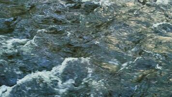 The texture of the stream of a mountain river that flows with great speed. video