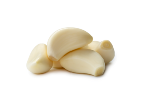 Peeled garlic cloves in stack isolated with clipping path. and shadow in png file format