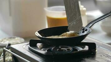 close up of hands making an omelet video