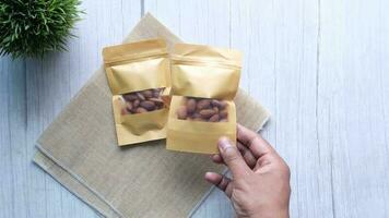 Top view of almond nuts in a packet video