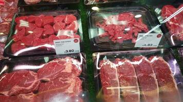 Different part of beef meat on display for sale video