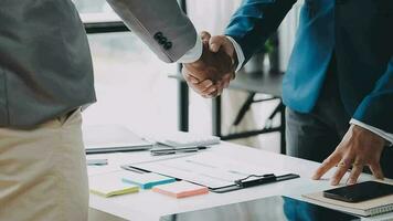 Business handshake for teamwork of business merger and acquisition,successful negotiate,hand shake,two businessman shake hand with partner to celebration partnership and business deal concept video