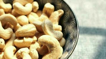 Cashew nuts in a bowl close up video