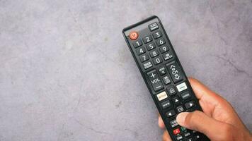dhaka bangladesh 20 may 2022. tv remote with netflix and amazon prime button video