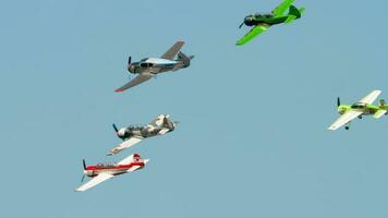 NOVOSIBIRSK, RUSSIAN FEDERATION JULY 28, 2019 - Sport trainer aircrafts Yakovlev family performance group aerobatic flight. Airshow at the Mochische aerodrome UNNM video