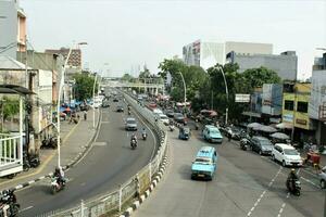 jakarta, indonesia-23 april 2023 jatinegara highway at noon photo