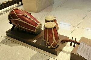 jakarta, indonesia-23 april 2023 gendang musical instruments from Kalimantan with the theme of Indonesian traditional musical instruments photo