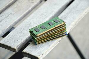 Top view, RAM used for notebook, laying on wooden floor photo