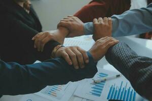 Success Teamwork Concept, Business people joining hands city background. photo