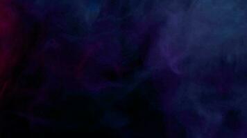 Smoke from Ultrasonic Aroma Diffuser and colorful light on black background. video
