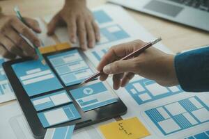 ux Graphic designer creative sketch planning application process development prototype wireframe for web mobile phone . User experience concept. photo