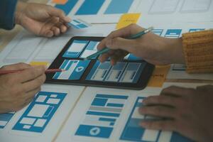 ux Graphic designer creative sketch planning application process development prototype wireframe for web mobile phone . User experience concept. photo