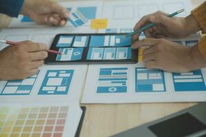 ux Graphic designer creative sketch planning application process development prototype wireframe for web mobile phone . User experience concept. photo