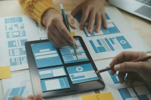 ux Graphic designer creative sketch planning application process development prototype wireframe for web mobile phone . User experience concept. photo