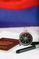 Magnetic compass, Russian pass and black pen on ballot paper. photo