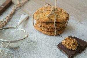 Five biscuits with wallnuts and chocolate chips photo