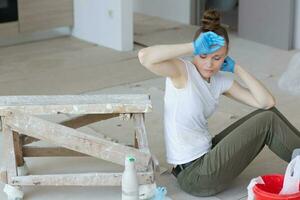 Young lady renovates  apartment photo