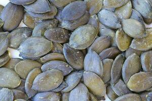 Green pumpkin seeds. Background photo