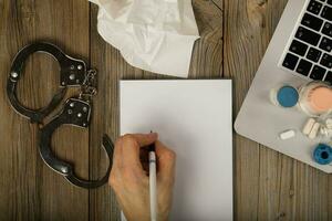 Blank sheet of paper and human hand. photo