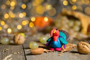 Handmade turkey on Thanksgiving background with blurred night lights. photo