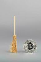 Bitcoin and mini sweeper. photo