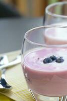 Blueberry yogurt in the glasses photo