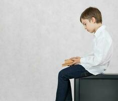 Boy and an old TV. Free space for a text. photo