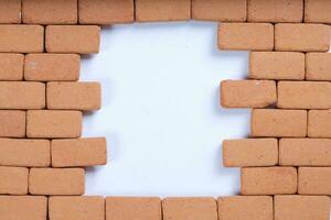 Space done in a red brick wall. Background.Closeup photo