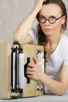 Young lady  with typing machine. Closeup photo