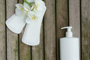 Hygiene items of a woman on a wooden surface. Background photo