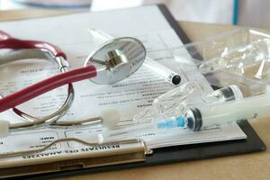 Ampules with antibiotics on a tables of a doctor photo