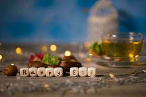 Congratulation HAPPY EID composed of wooden dices photo
