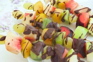 Fruit salad skewers photo