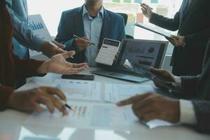 Team of business people are meeting to analyze data for marketing plan,Market research reports and income statistics, Financial and Accounting concept. photo