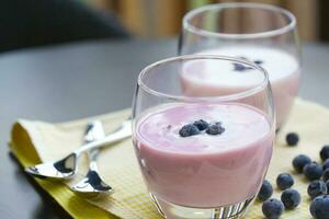 Blueberry yogurt in the glasses photo