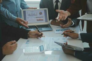 Team of business people are meeting to analyze data for marketing plan,Market research reports and income statistics, Financial and Accounting concept. photo