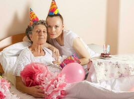 Senior woman celebrates her birthday photo