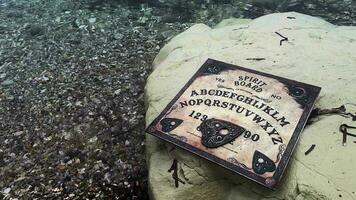 Spiritual Scary Witchcraft Ouija Board in Outdoor Concept video