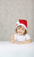 Boy in Santas hat photo