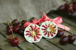 Cherry vanilla ice-cream with caramel topping. Closeup photo