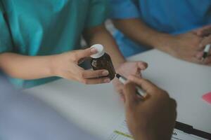 Cropped image of successful medical doctors discussing diagnosis during the conference photo