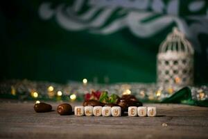 Congratulation HAPPY EID composed of wooden dices. photo