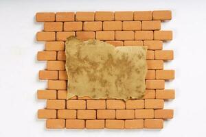 Brick wall on a white surface. Background.Closeup photo