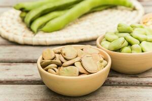 Dried beans in the clay dish photo