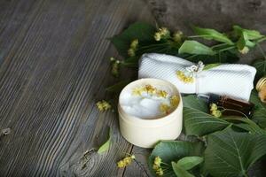 Face cream with linden blossoms. photo