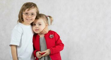 Boy of five years and girl of 2 years are staying together. photo