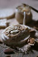 Homemade almond butter on a slice of rice crispbread. photo