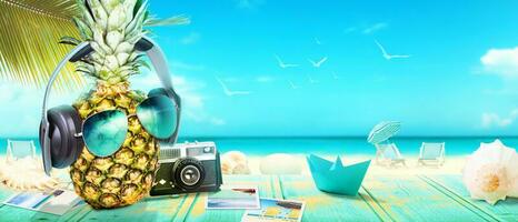 Creative pineapple with sunglasses on summer background. photo